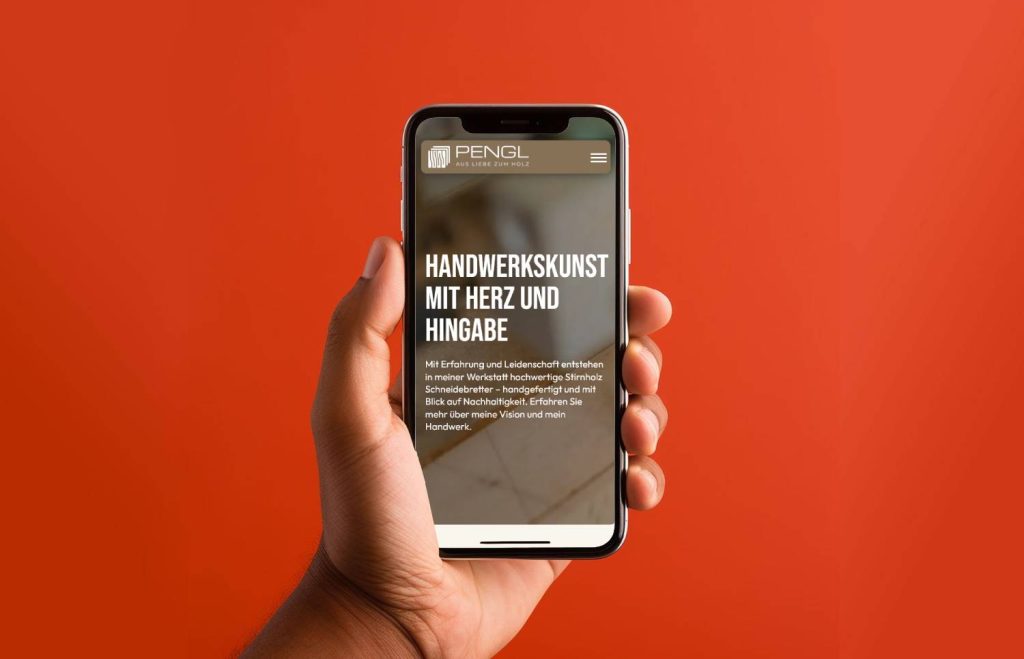 Iphone mit einer mobil optimierten Handwerkerwebsite für einen Schreiner